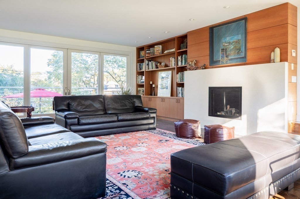 185 Franklin Street Newton, MA 02458 - Photo 5 of 23 a living room with furniture and a flat screen tv