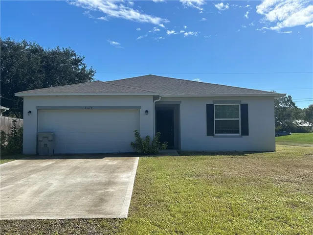 a front view of house with yard