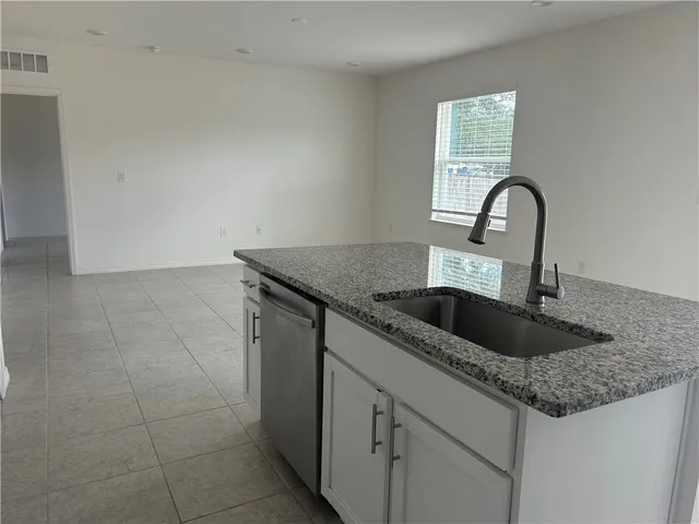 a close view of a sink and tap