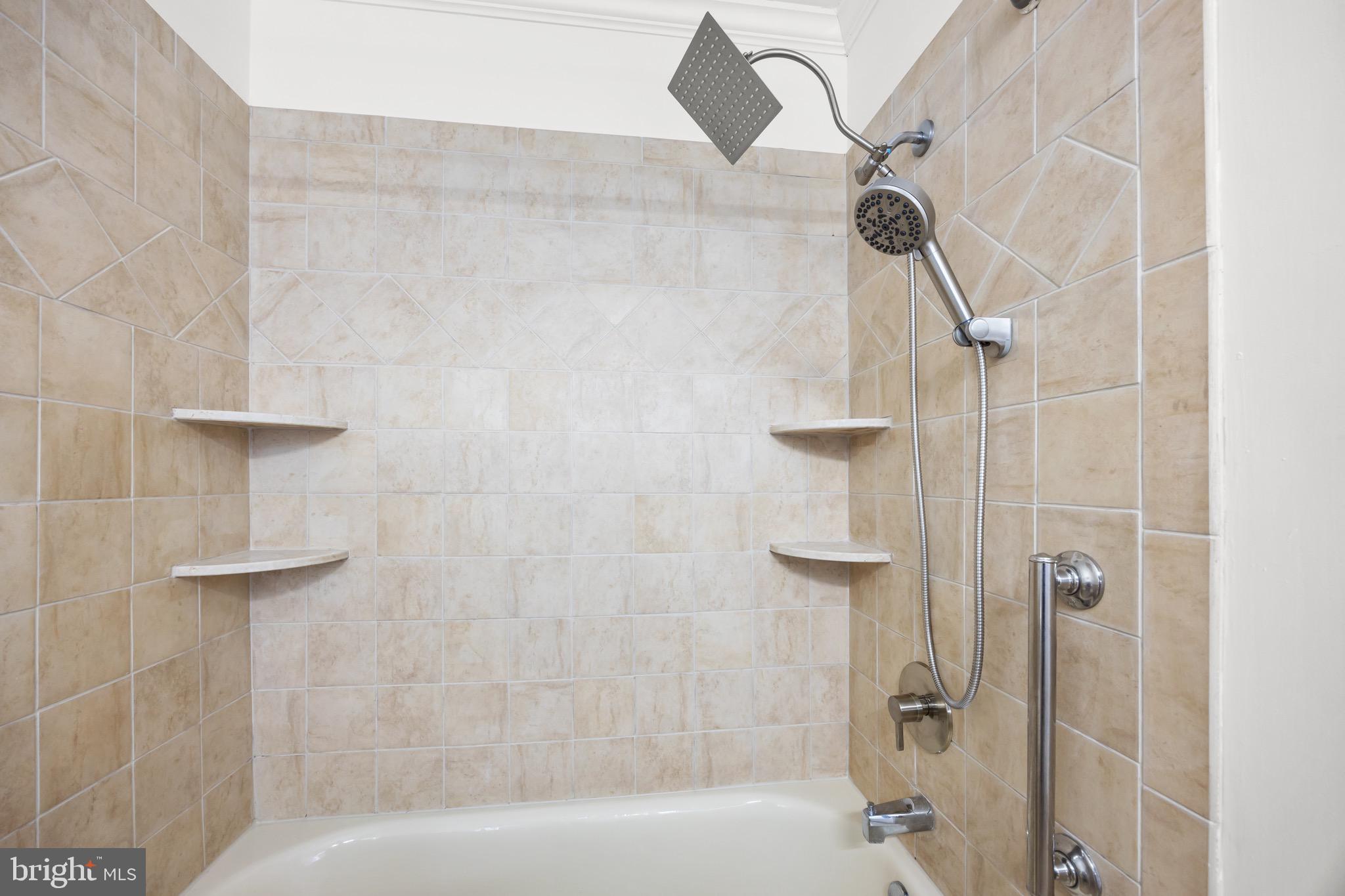 207 Yardley Commons Yardley, PA 19067 - Photo 16 of 19 a bathroom with a shower