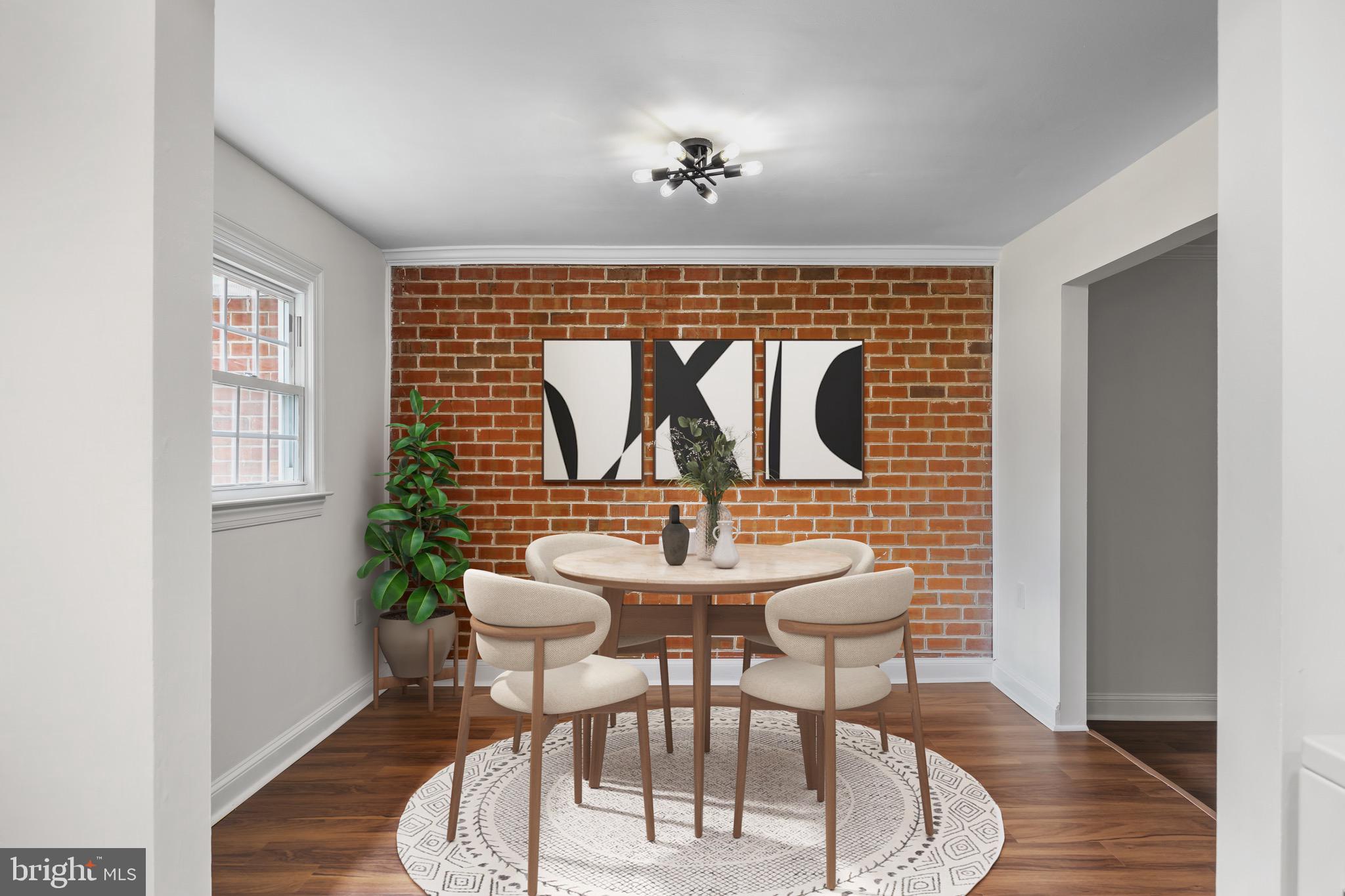207 Yardley Commons Yardley, PA 19067 - Photo 19 of 19 a dining room with furniture a rug and wooden floor
