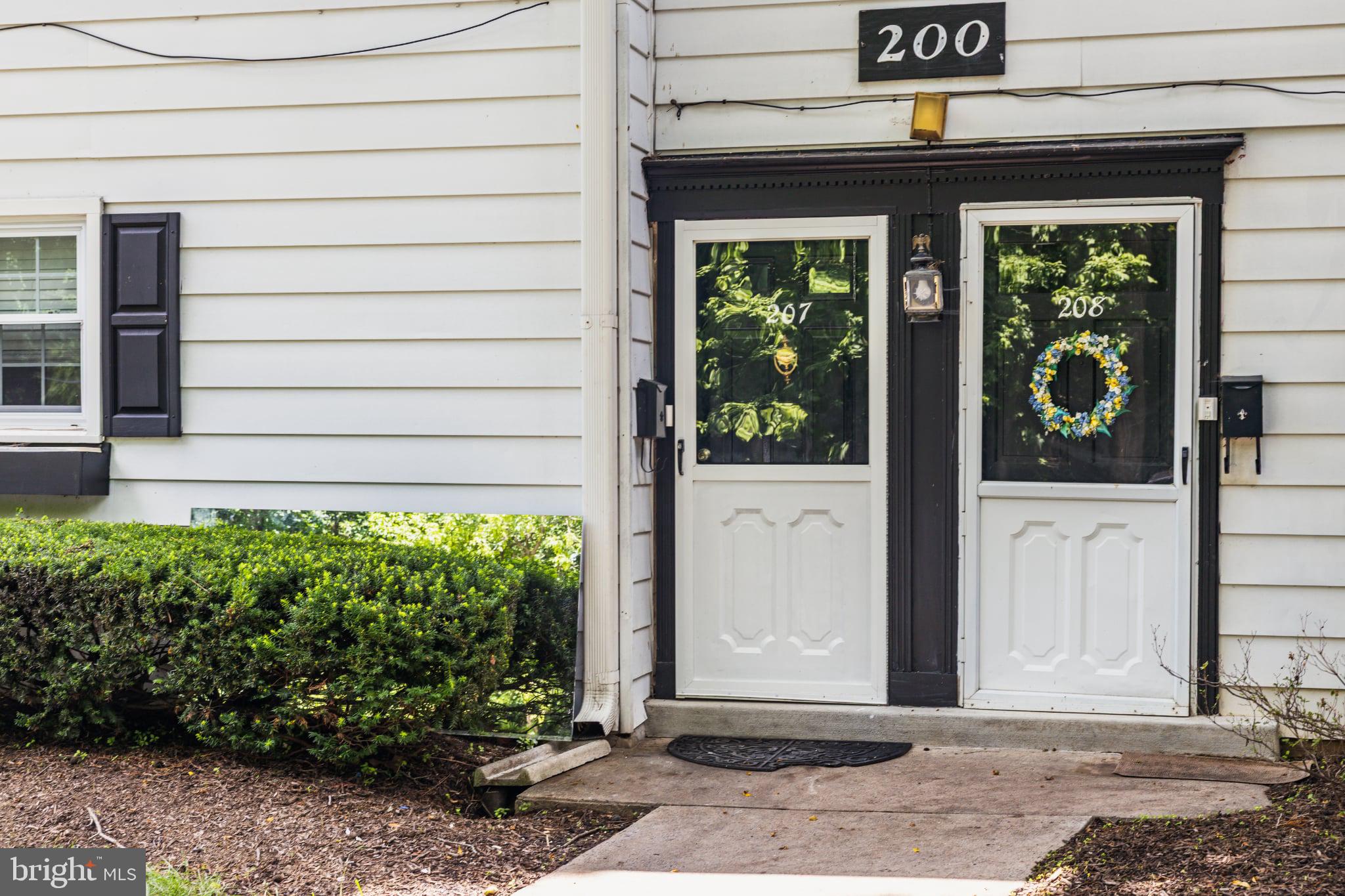 207 Yardley Commons Yardley, PA 19067 - Photo 2 of 19 a view of entrance door of the house