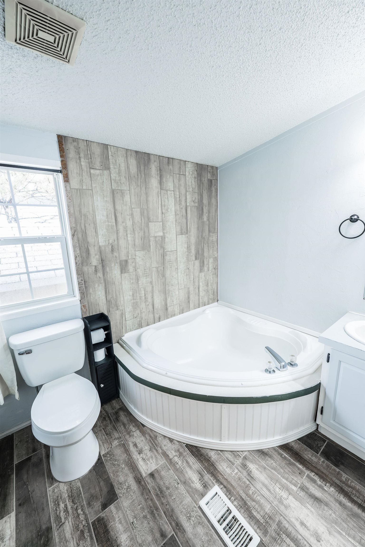 435 32 Road, Unit 620 Clifton, CO 81520 - Photo 12 of 20 a white toilet sitting next to a bathroom sink