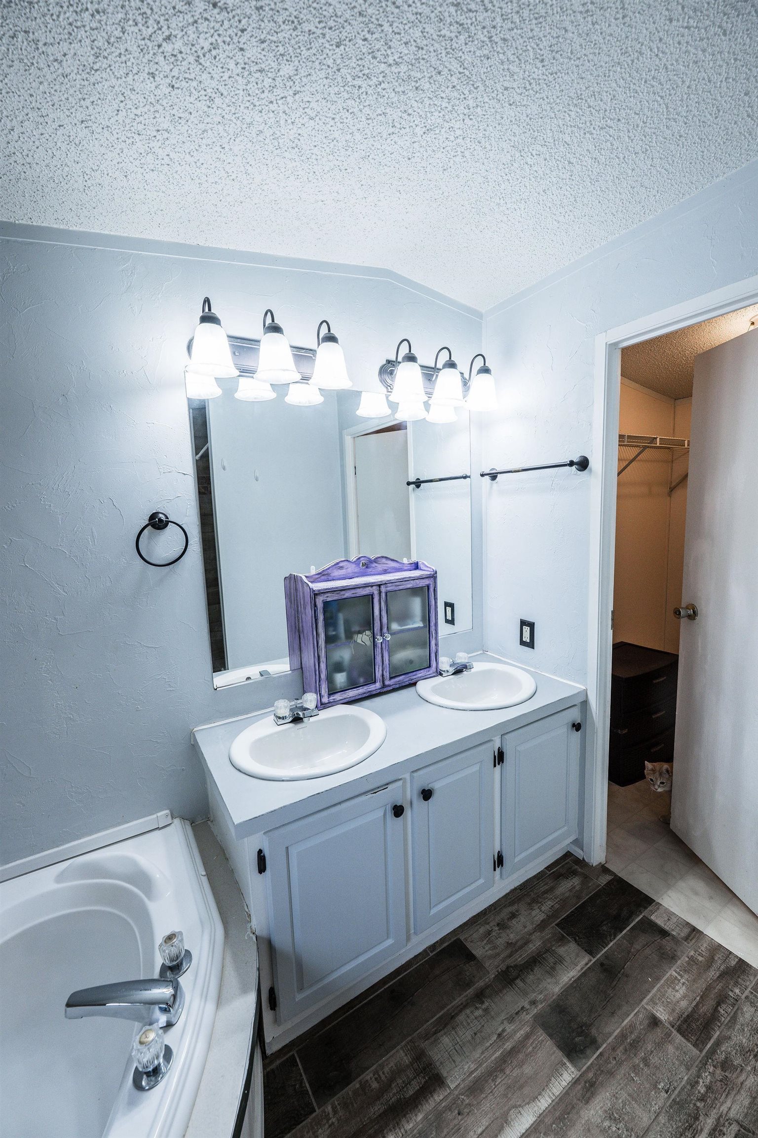 435 32 Road, Unit 620 Clifton, CO 81520 - Photo 14 of 20 a bathroom with a double vanity sink mirror and toilet