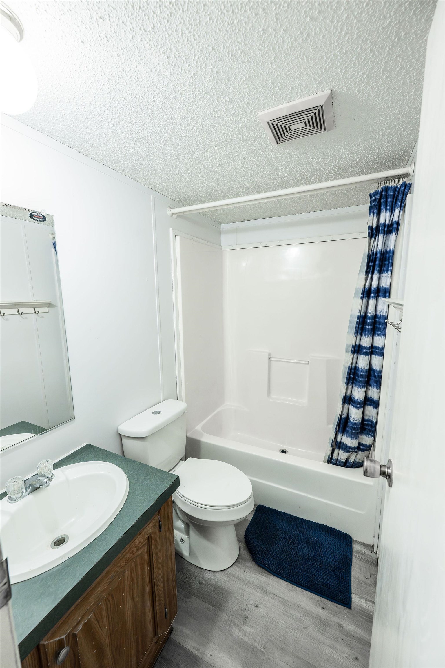 435 32 Road, Unit 620 Clifton, CO 81520 - Photo 17 of 20 a bathroom with a sink a toilet and shower