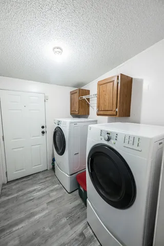 a utility room with dryer and washer