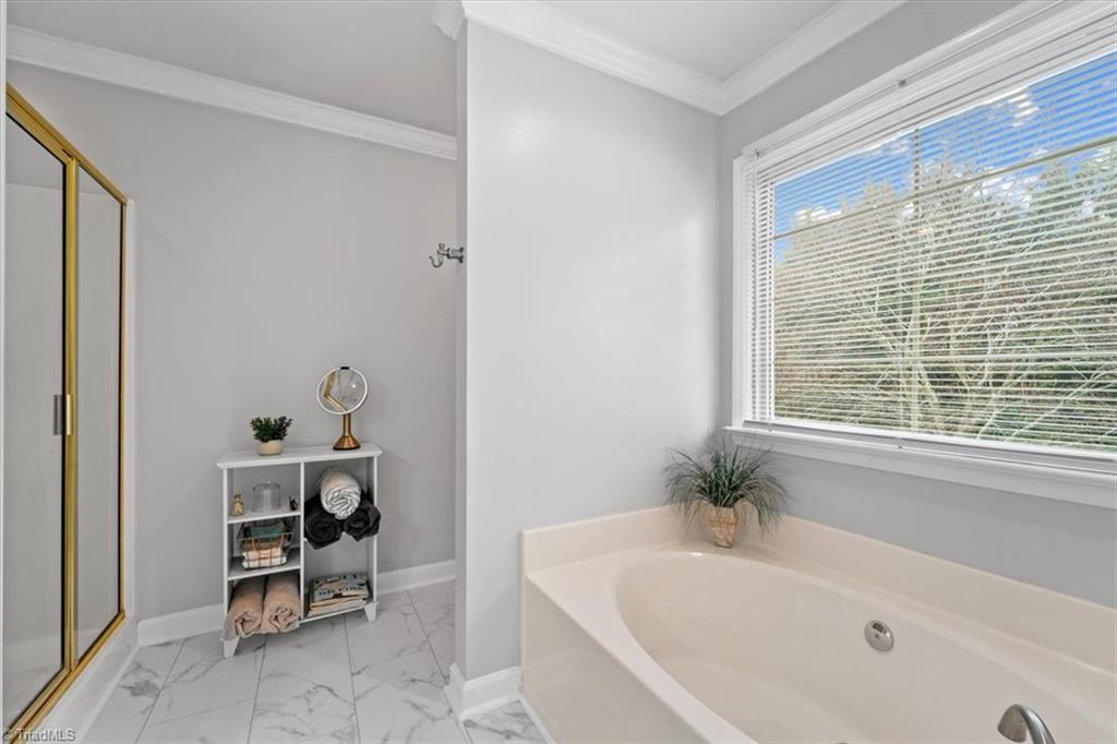 5515 Union Grove Road Oak Ridge, NC 27310 - Photo 23 of 37 Garden tub and separate shower.