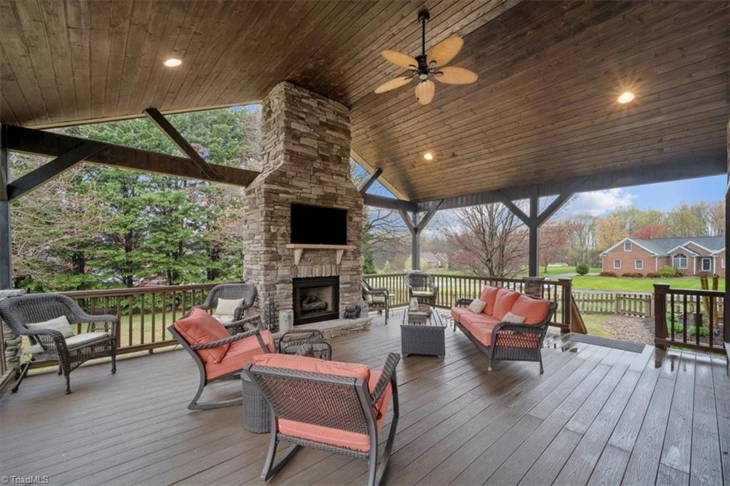 5515 Union Grove Road Oak Ridge, NC 27310 - Photo 29 of 37 This covered porch is a relaxing retreat.