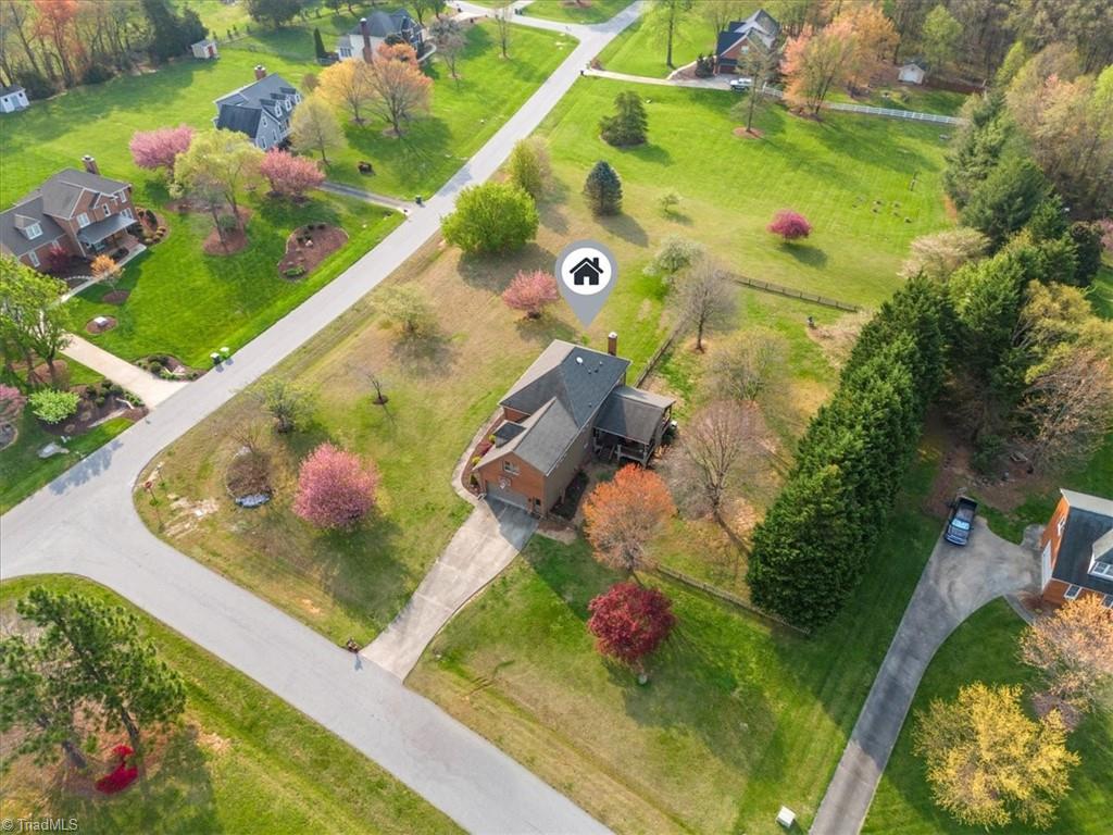 5515 Union Grove Road Oak Ridge, NC 27310 - Photo 35 of 37 Great 1.57 acre yard with large portion fenced in the back.