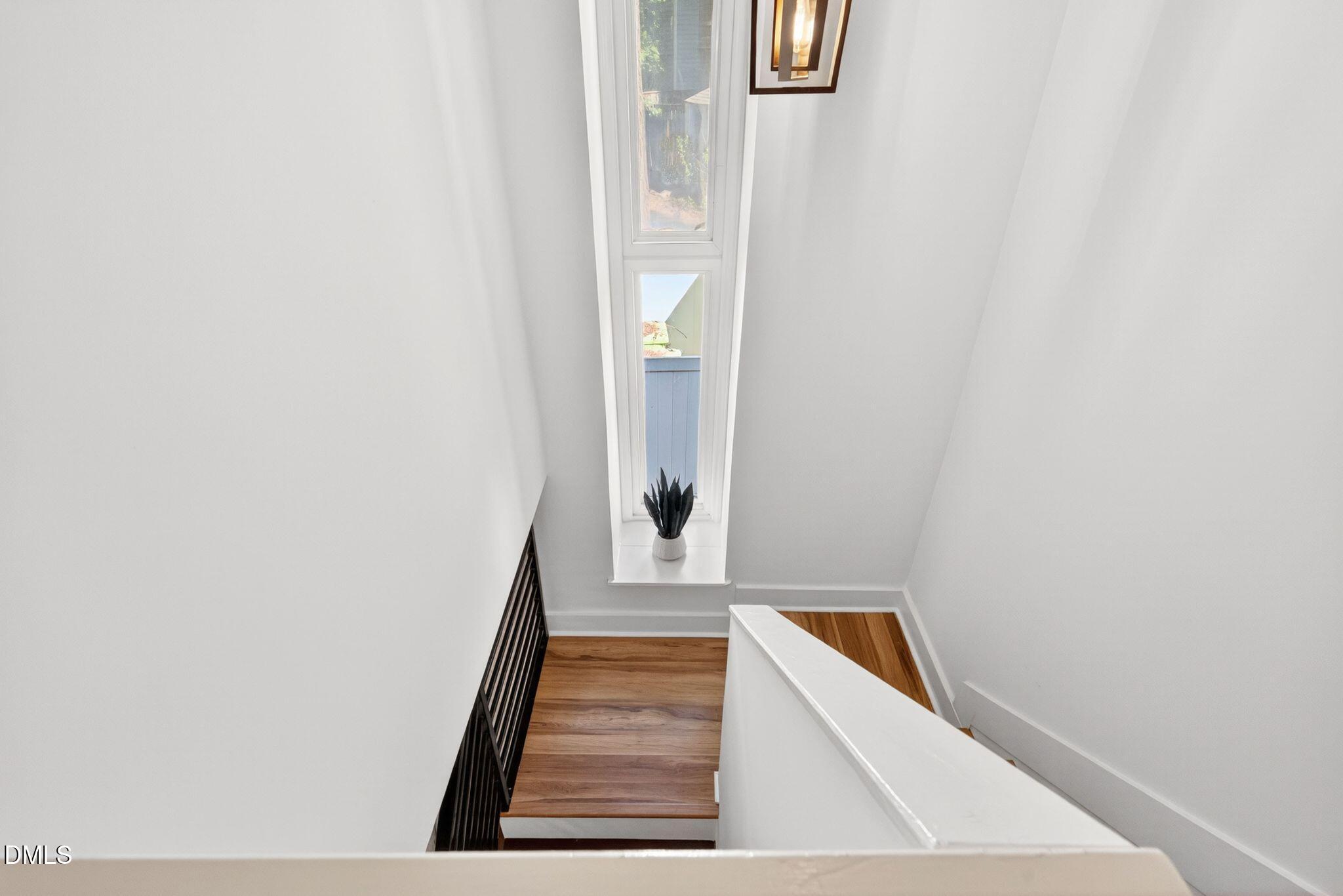 7149 Sandy Creek Drive Raleigh, NC 27615 - Photo 12 of 20 37_17-7149-sandy-creek-dr-hallway