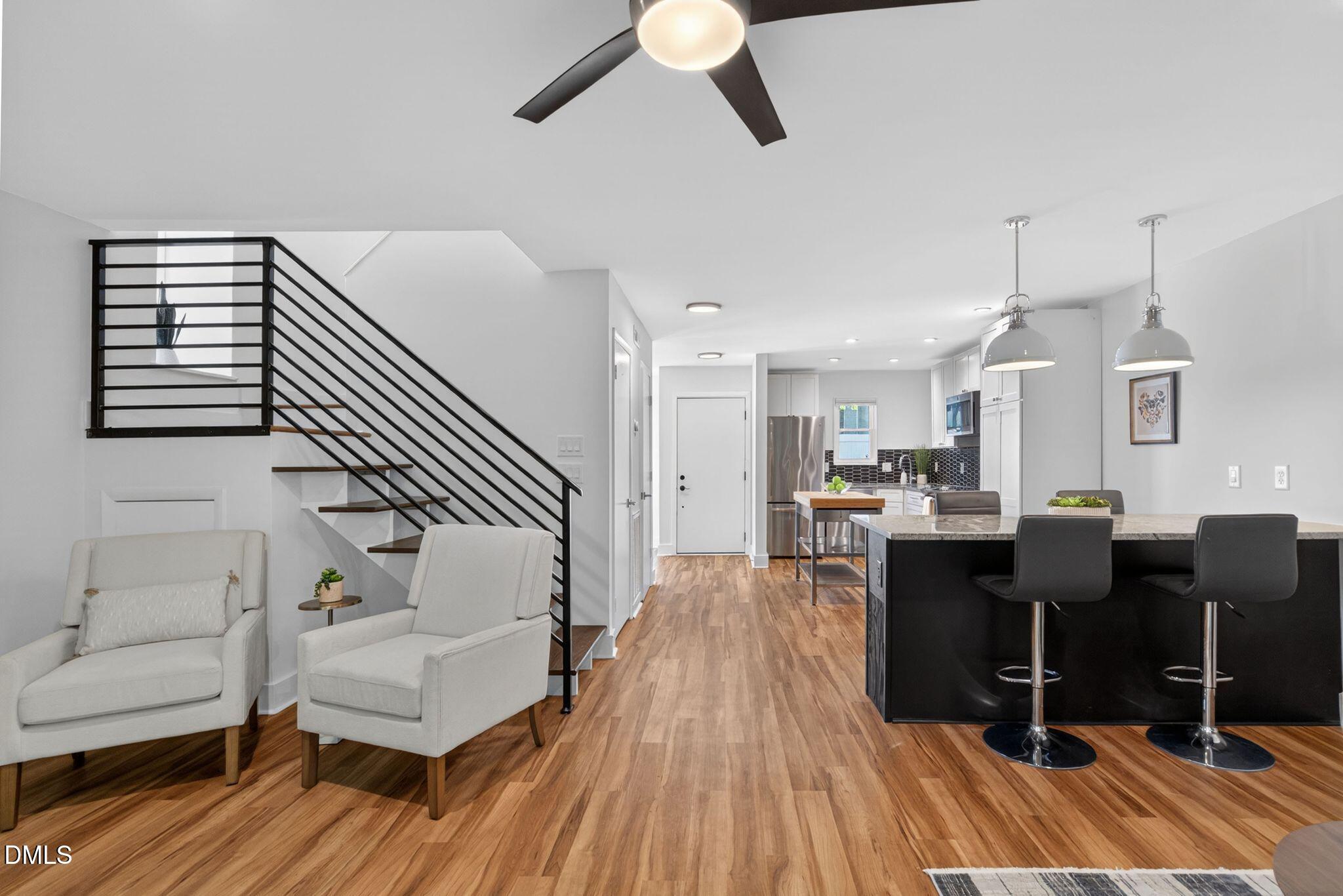 7149 Sandy Creek Drive Raleigh, NC 27615 - Photo 7 of 20 25_05-7149-sandy-creek-dr-living-room