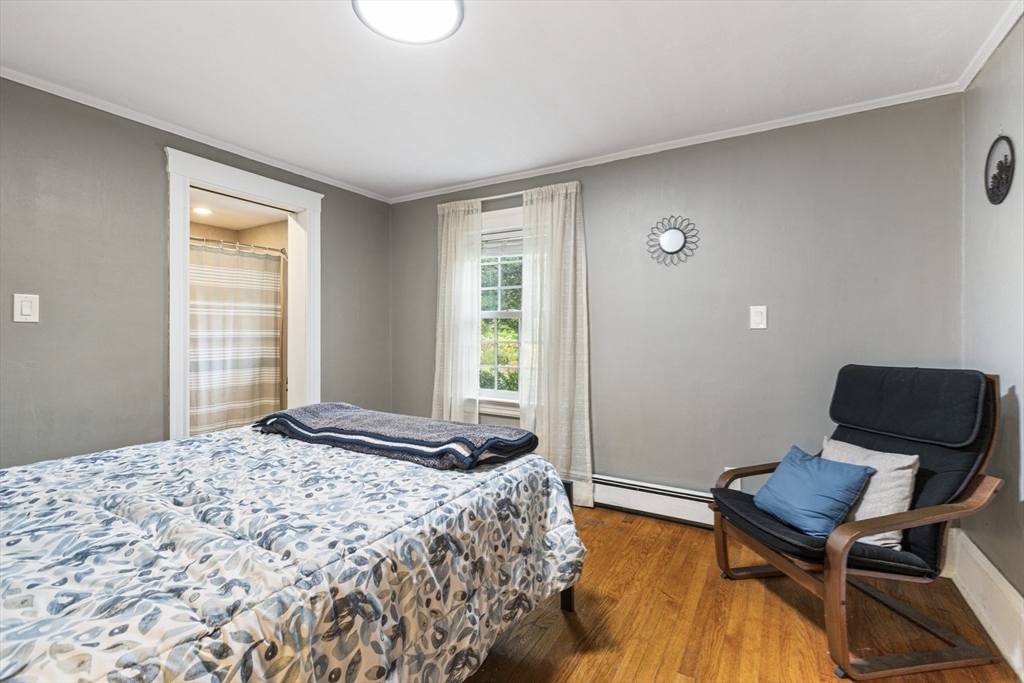 380 North Main Street Sharon, MA 02067 - Photo 21 of 35 a bedroom with a bed and a window