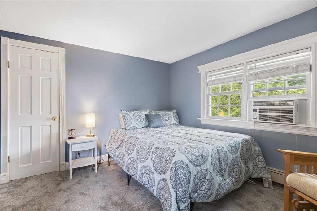 380 North Main Street Sharon, MA 02067 - Photo 24 of 35 a bedroom with a bed and a window