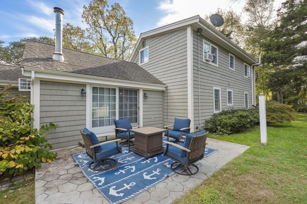 380 North Main Street Sharon, MA 02067 - Photo 28 of 35 a view of a backyard with sitting area