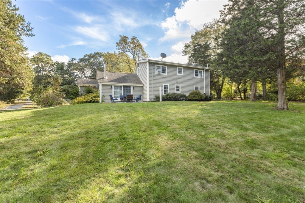380 North Main Street Sharon, MA 02067 - Photo 29 of 35 a view of a house with a big yard and large trees
