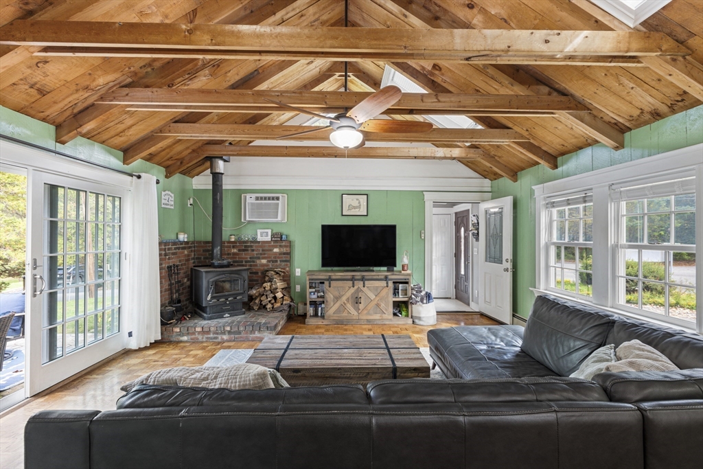 380 North Main Street Sharon, MA 02067 - Photo 5 of 35 a living room with furniture and flat screen tv
