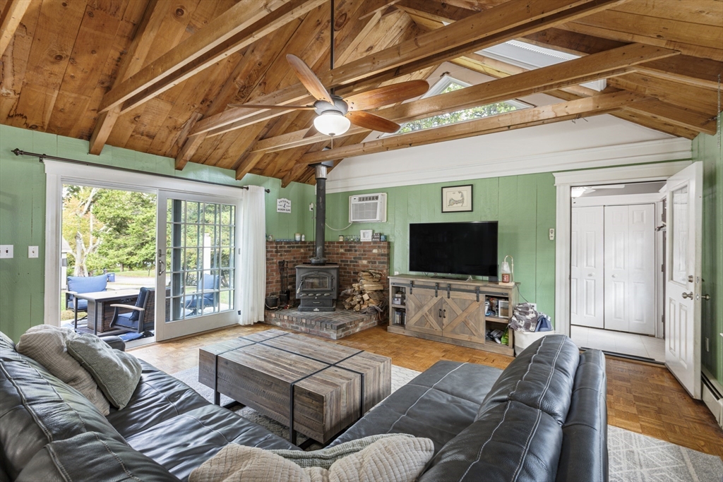 380 North Main Street Sharon, MA 02067 - Photo 7 of 35 a living room with furniture and a flat screen tv