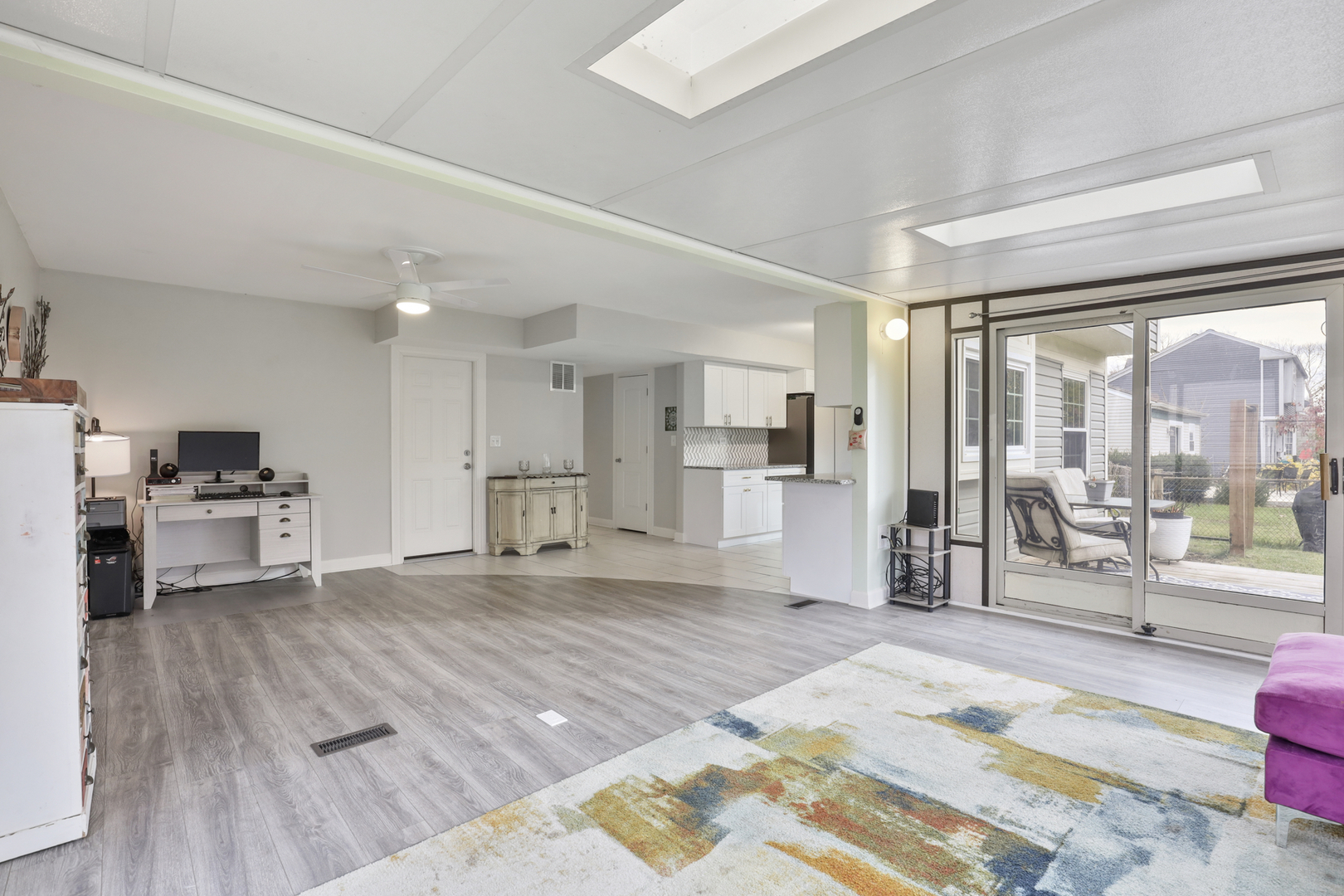 1475 Farrington Lane Aurora, IL 60504 - Photo 12 of 45 a view of a living room kitchen and a wooden floor