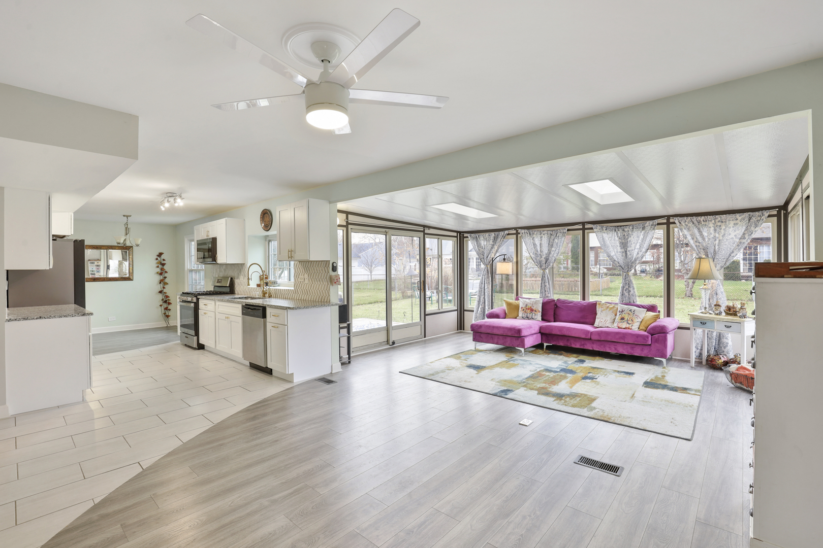 1475 Farrington Lane Aurora, IL 60504 - Photo 13 of 45 a living room with kitchen and furniture