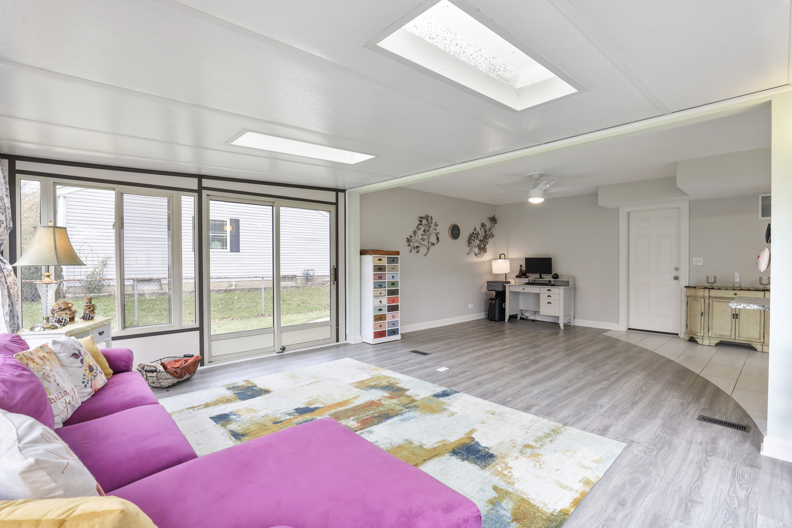 1475 Farrington Lane Aurora, IL 60504 - Photo 16 of 45 a living room with furniture and a large window
