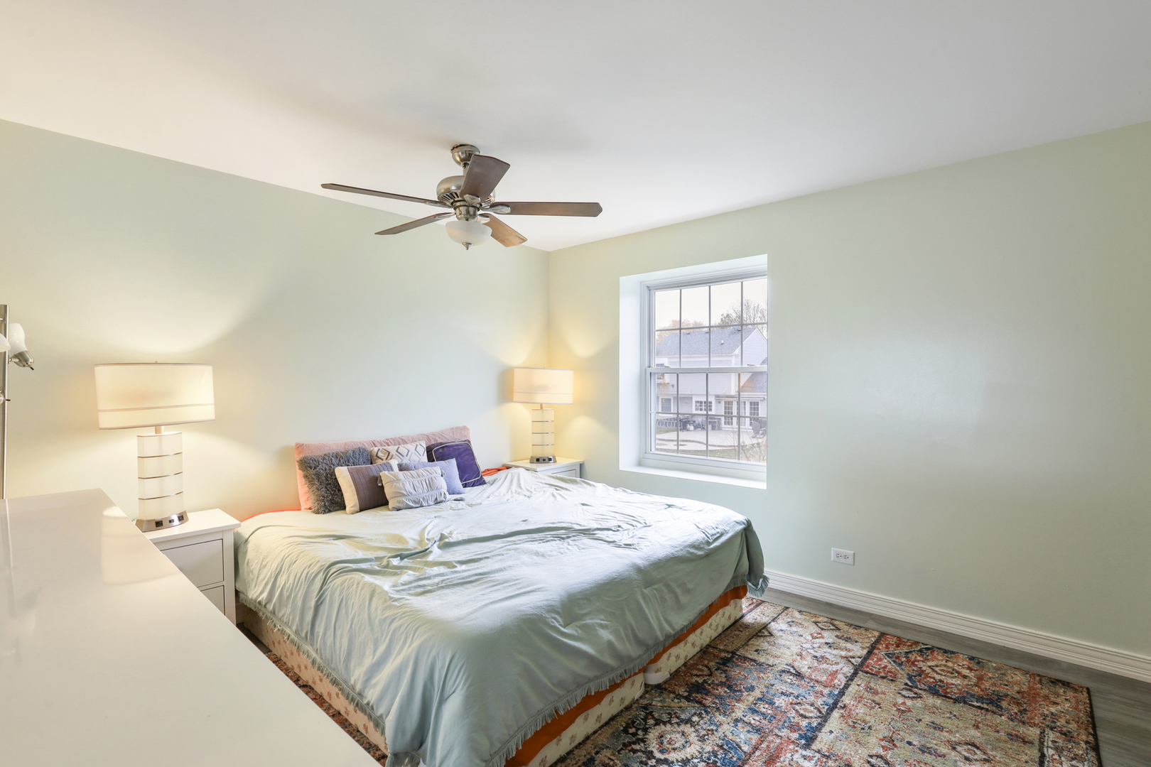 1475 Farrington Lane Aurora, IL 60504 - Photo 40 of 45 a bedroom with a large bed and a window