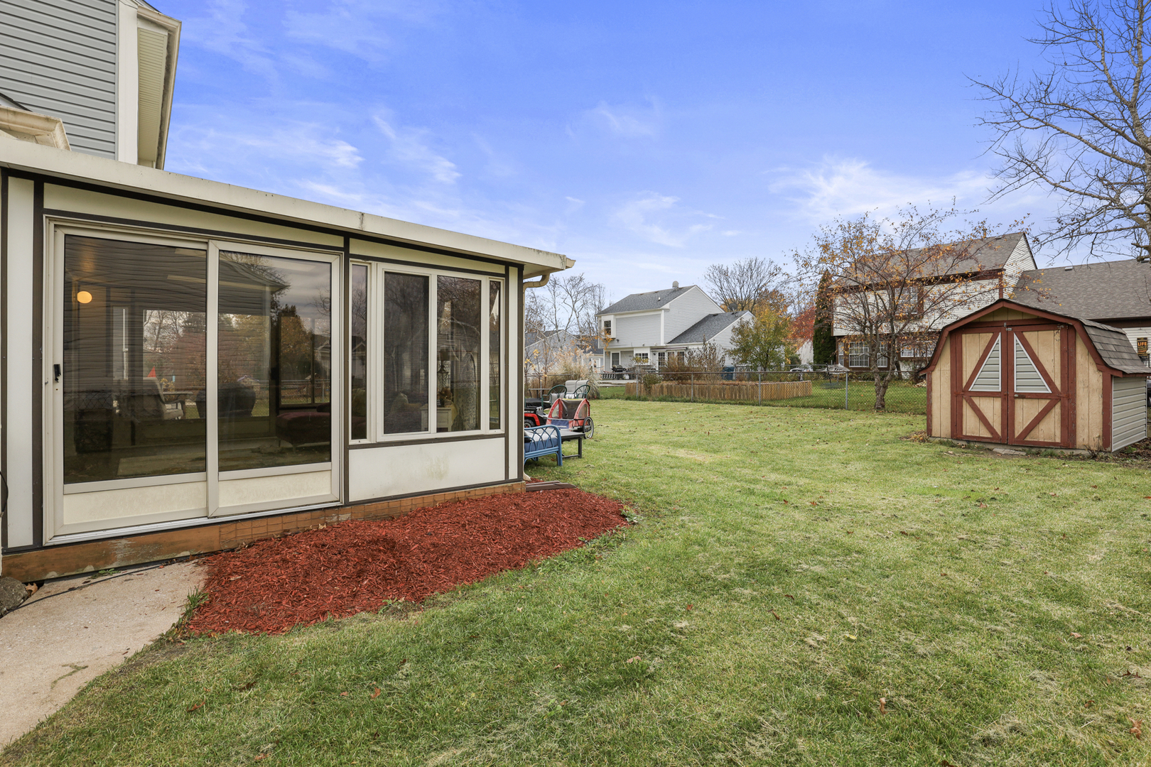 1475 Farrington Lane Aurora, IL 60504 - Photo 4 of 45 a view of a house with backyard and porch