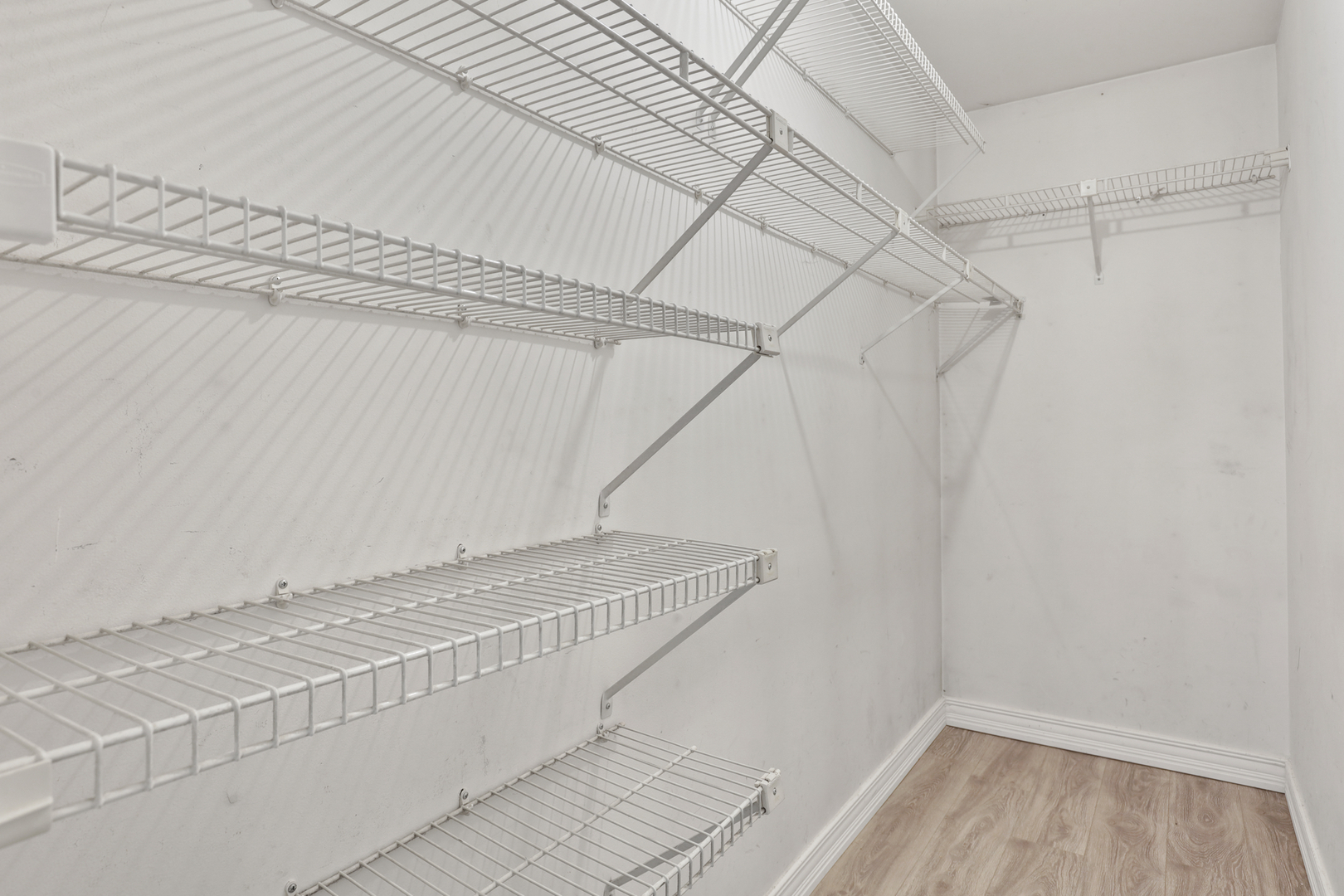 1475 Farrington Lane Aurora, IL 60504 - Photo 43 of 45 a view of a room with racks on the wall