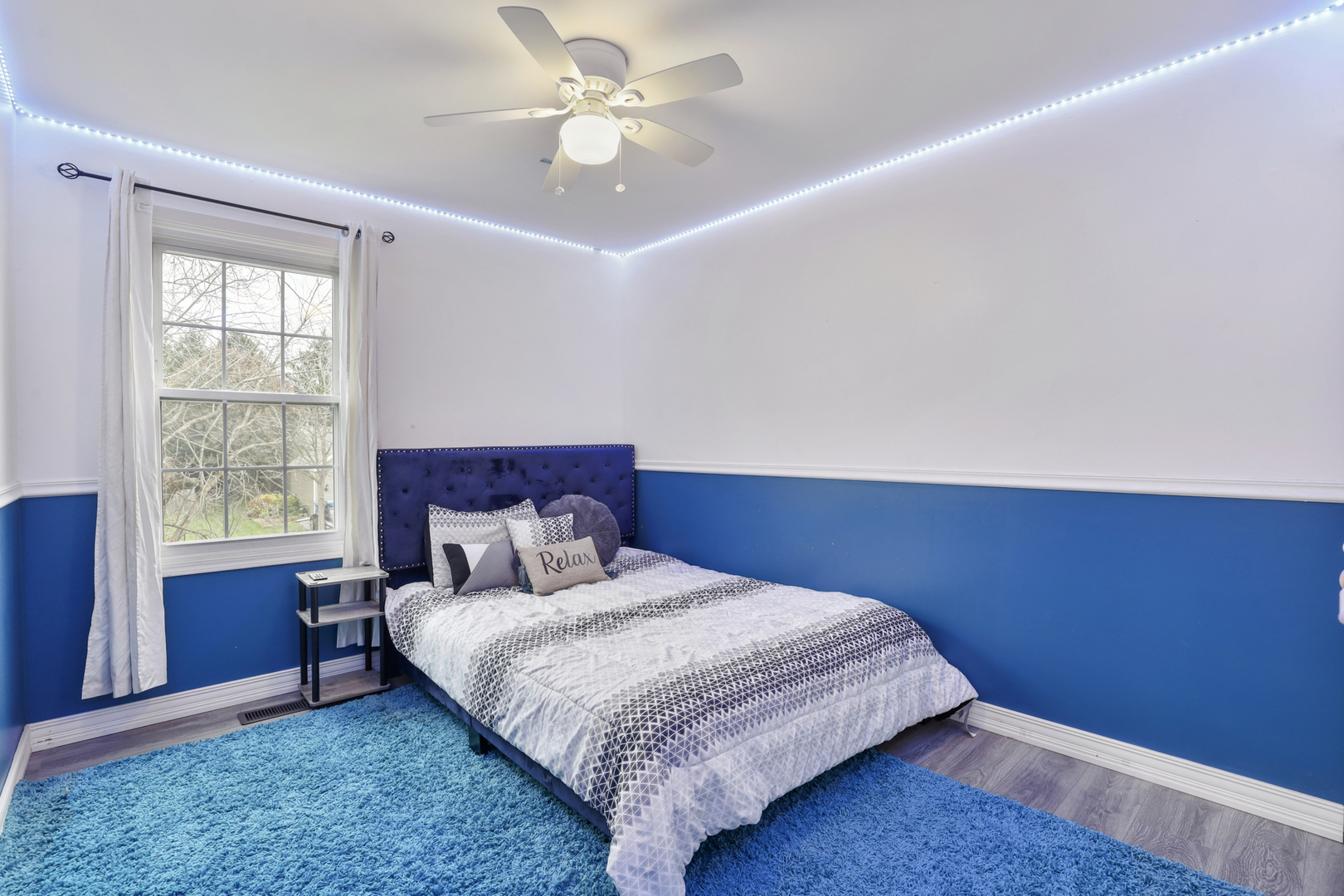 1475 Farrington Lane Aurora, IL 60504 - Photo 45 of 45 a bedroom with a large bed and a window