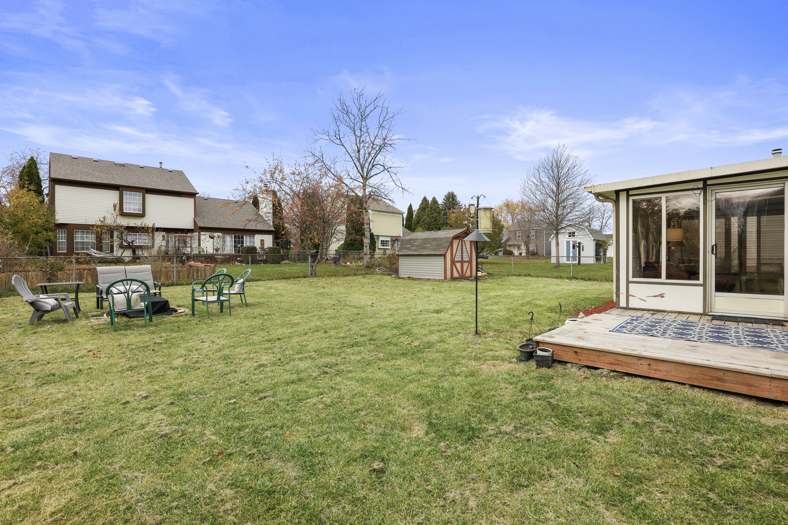 1475 Farrington Lane Aurora, IL 60504 - Photo 8 of 45 a view of a house with backyard porch and sitting area