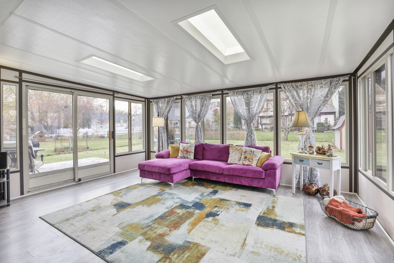 1475 Farrington Lane Aurora, IL 60504 - Photo 10 of 45 a living room with furniture and floor to ceiling windows