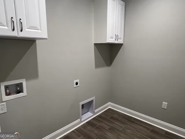 a view of small space with racks on the wall