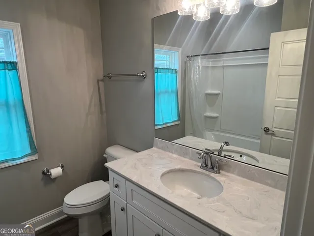 an empty room with a empty space and a window