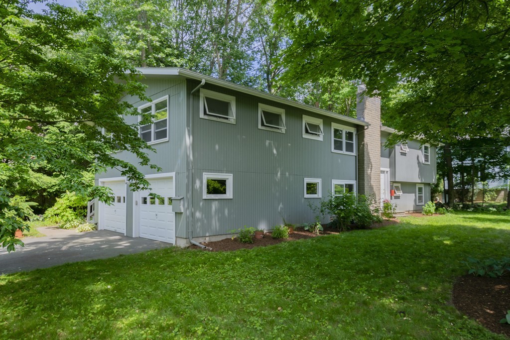 75 Reed Street Lexington, MA 02421 - Photo 30 of 30 a front view of house with yard and trees