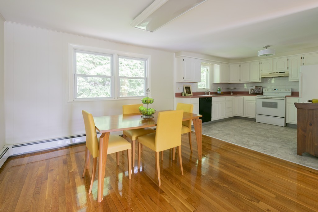 75 Reed Street Lexington, MA 02421 - Photo 6 of 30 a dining room with furniture and wooden floor