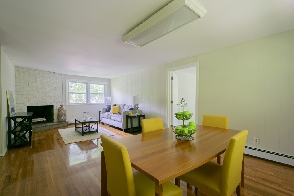 75 Reed Street Lexington, MA 02421 - Photo 8 of 30 a view of a dining room with furniture and wooden floor