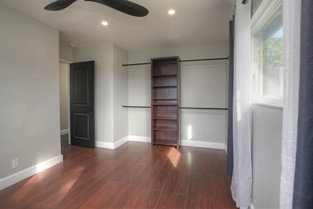 a bathroom with a sink a mirror and a shower