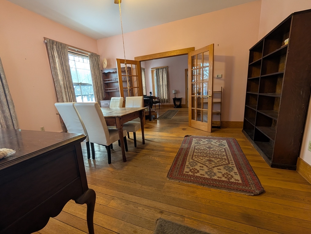 527 Main Street, Unit 1 Ashfield, MA 01330 - Photo 18 of 24 a view of a dining room with furniture