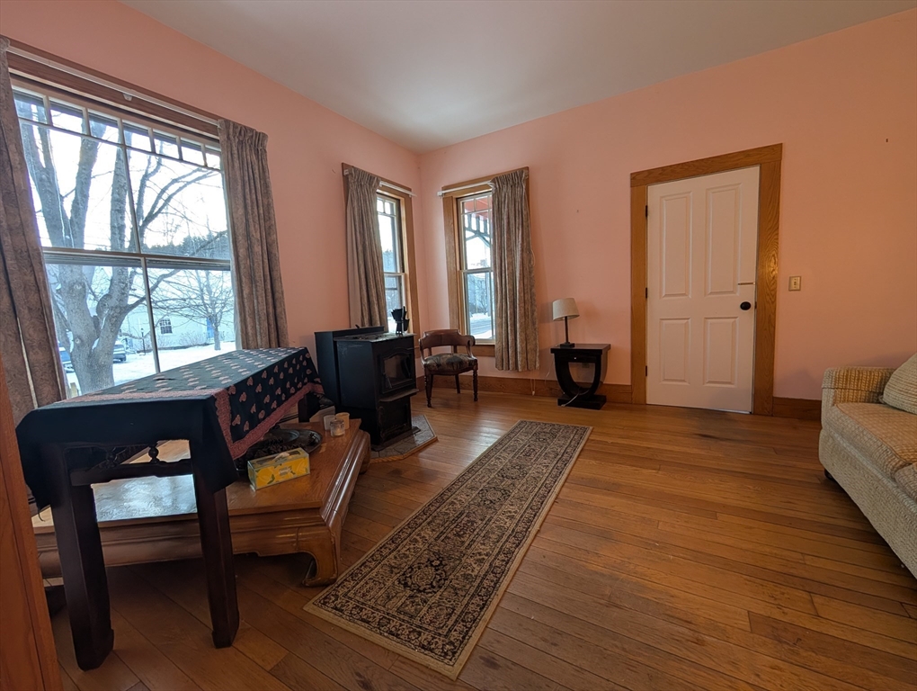 527 Main Street, Unit 1 Ashfield, MA 01330 - Photo 20 of 24 a living room with furniture and a window