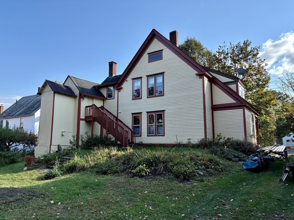 527 Main Street, Unit 1 Ashfield, MA 01330 - Photo 22 of 24 a front view of a house with garden