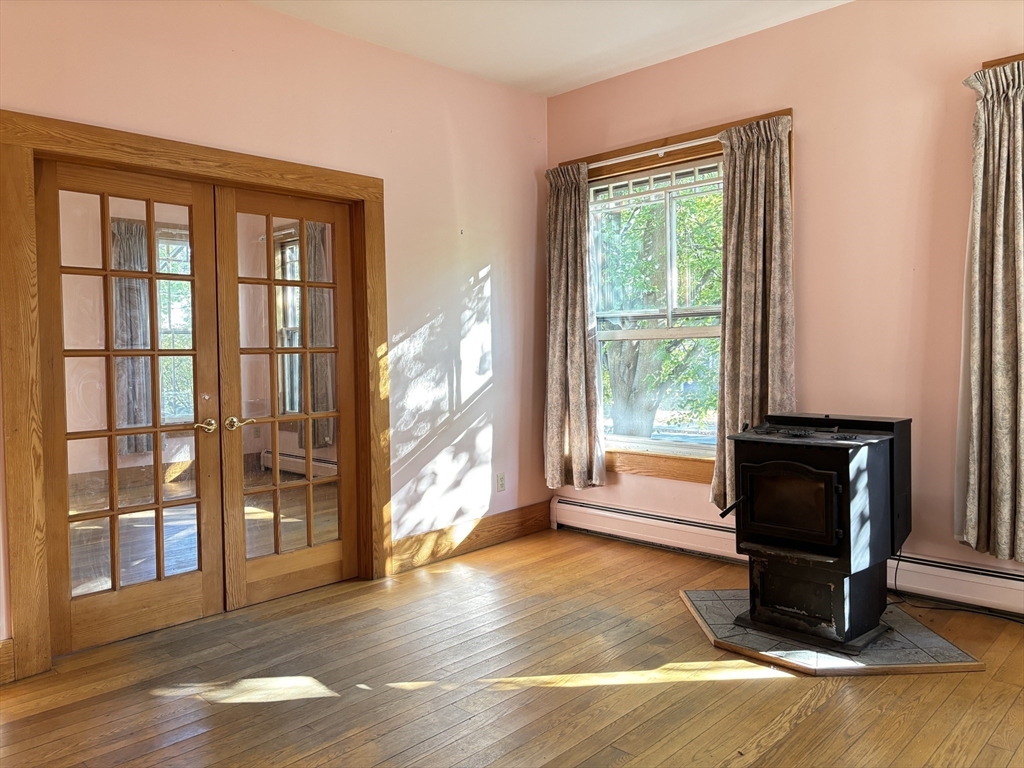 527 Main Street, Unit 1 Ashfield, MA 01330 - Photo 9 of 24 a living room with a large window