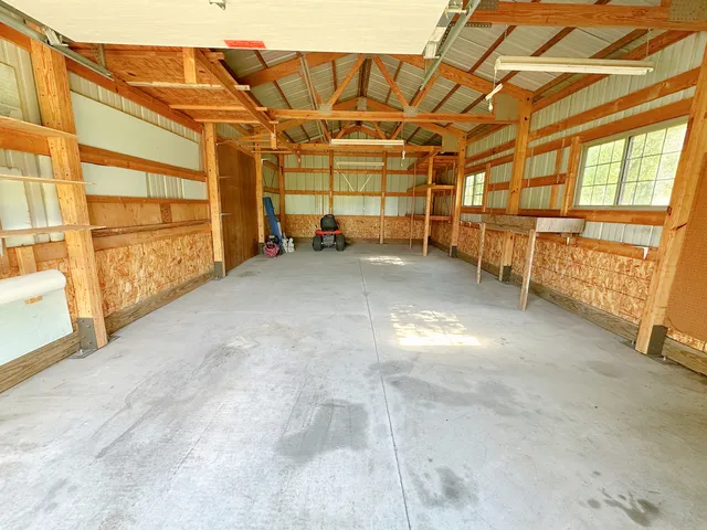 a view of a room with wooden walls