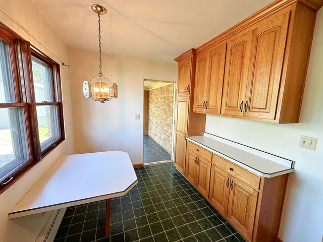 a bathroom with a sink a mirror and a shower