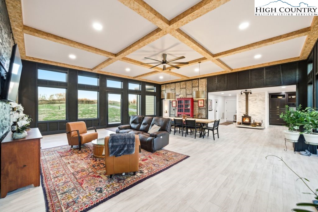 370 Laws Road Limestone, TN 37681 - Photo 16 of 49 a living room with furniture and wooden floor