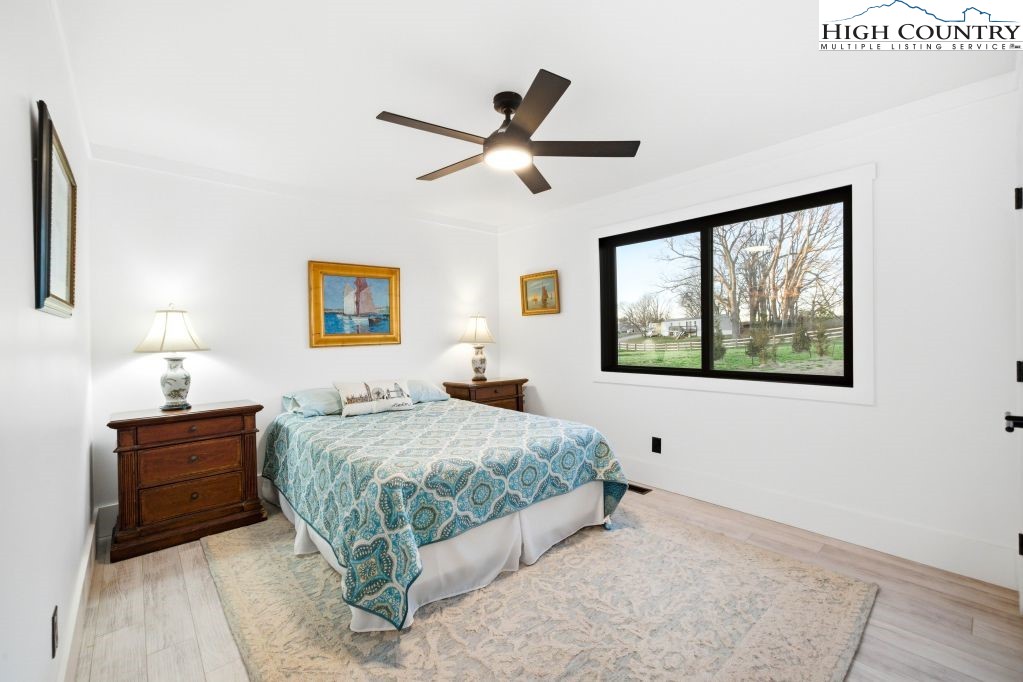 370 Laws Road Limestone, TN 37681 - Photo 37 of 49 a bedroom with a large bed and a window