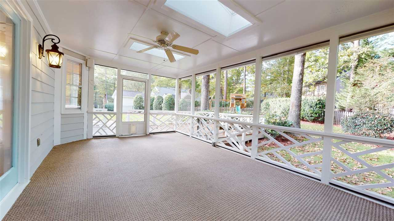 2604 Cobworth Court Raleigh, NC 27613 - Photo 21 of 30 This oversized screened porch is sure to be a favorite place to relax.
