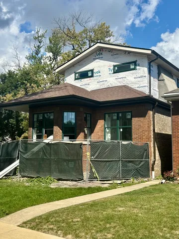 a view of house with outdoor space