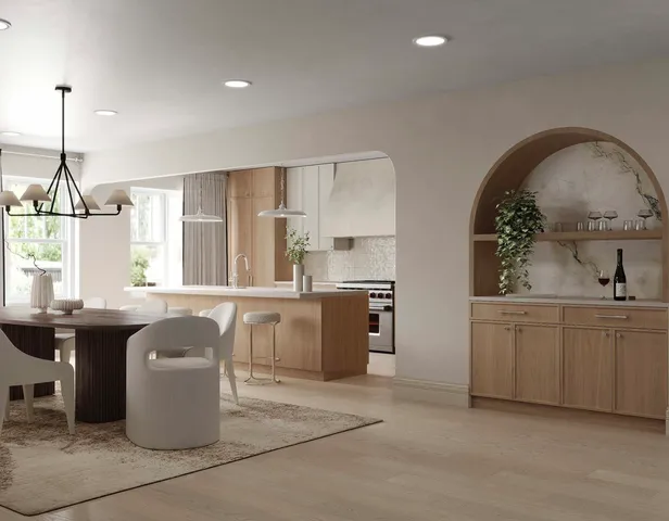 a kitchen with stainless steel appliances granite countertop a sink a stove a refrigerator and island