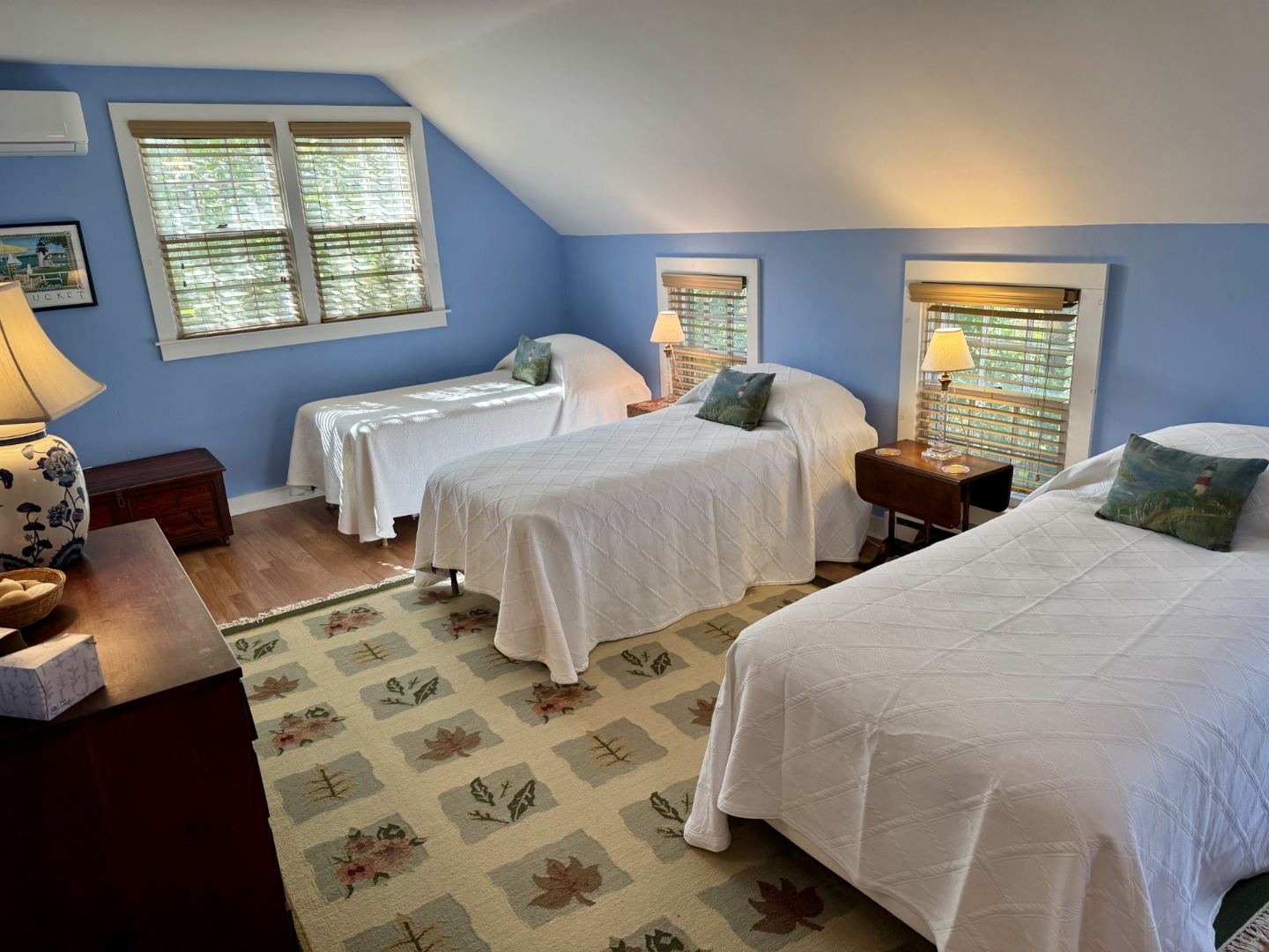 35 Sankaty Road Nantucket, MA 02554 - Photo 11 of 12 a bedroom with two beds and a window