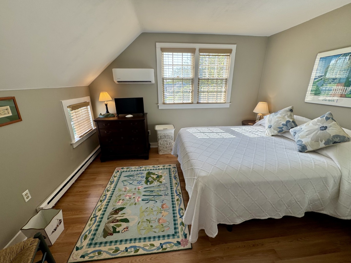 35 Sankaty Road Nantucket, MA 02554 - Photo 12 of 12 a bedroom with a bed and wooden floor
