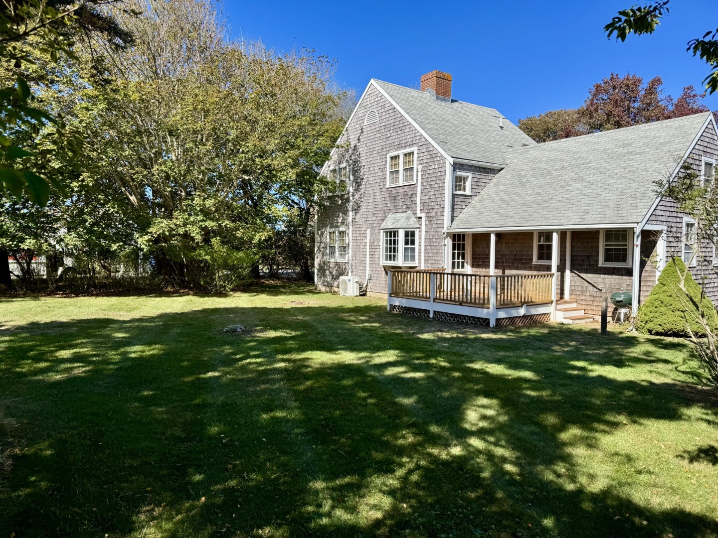 35 Sankaty Road Nantucket, MA 02554 - Photo 5 of 12 a view of a house with a backyard